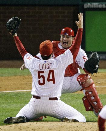 Philadelphia Phillies catcher Carlos Ruiz hits a infield single during  ninth inning World Series game 3 play with the Tampa Bay Rays in  Philadelphia at Citizens Bank Park October 25, 2008. His