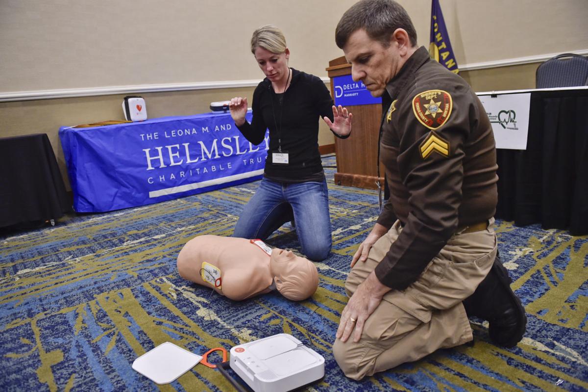 Kirby Dempster, with the Fergus County Sheriff's Department, right, and Heidi Visocan, Sheridan County Sheriff,