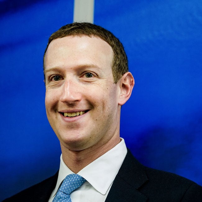 Mark Zuckerberg reacts to robot