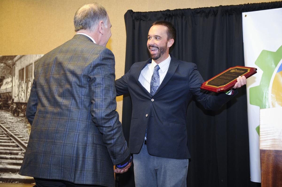 Jason Davis, awards Dick Anderson the business of the year