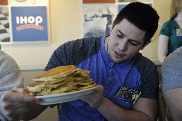 Carroll College football players pancake eating contest 