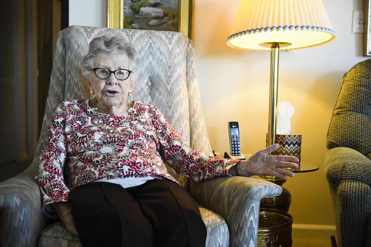 Mary Munger discusses her acts of philanthropy Thursday afternoon in her apartment.