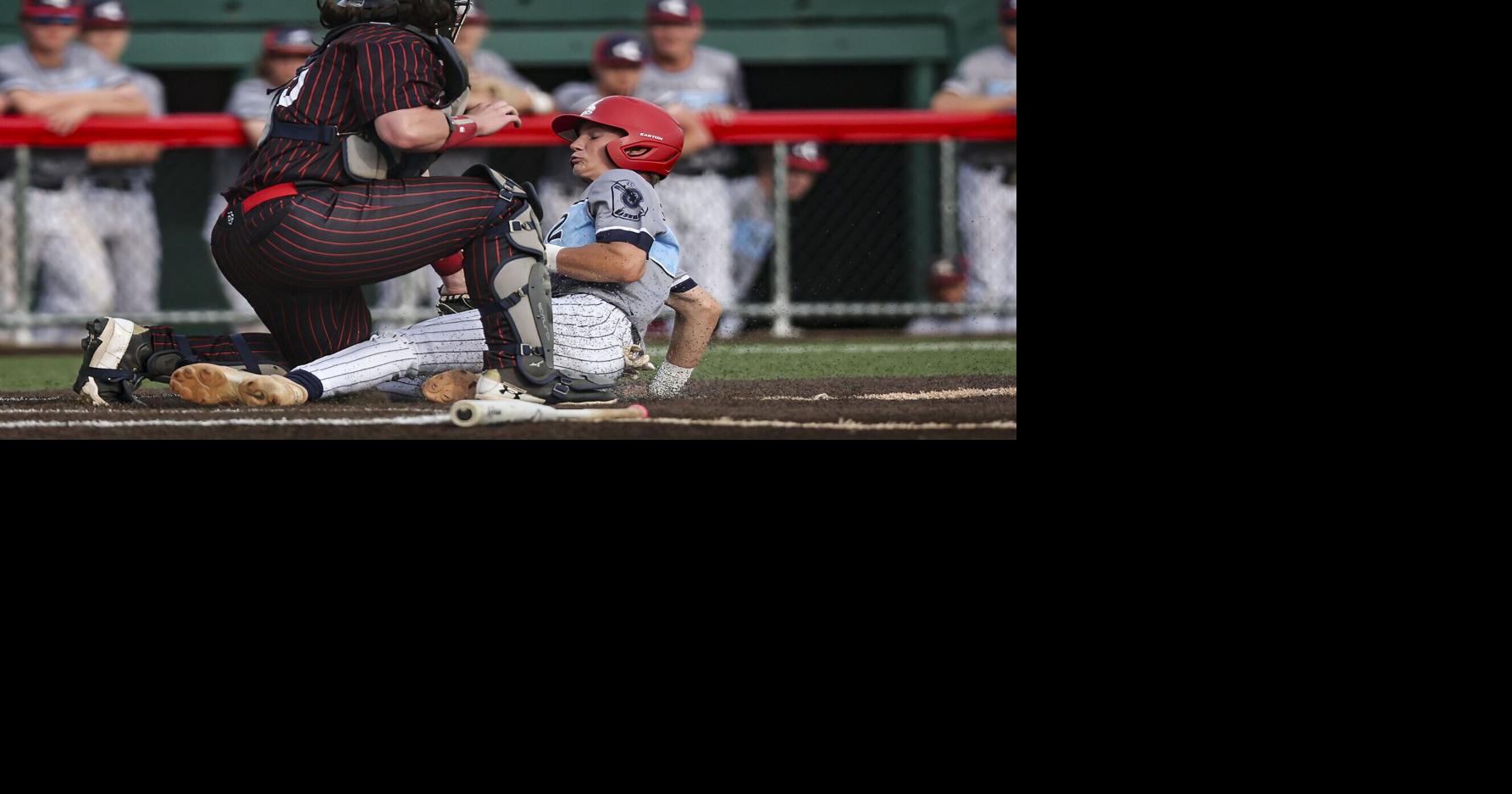 Matt Feller sliding vs. Calgary Cardinals