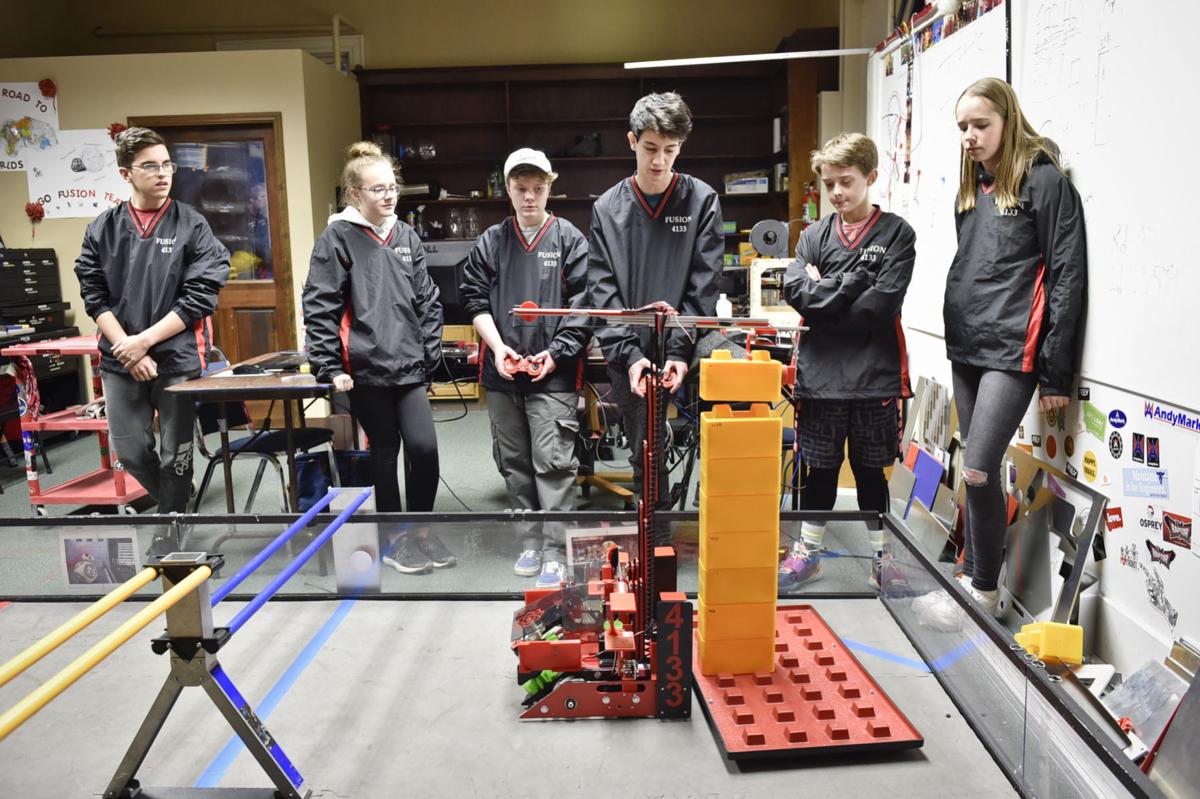 The Fusions Robotics team operates Oracle, the robot they will take to the world robotic competition this year.