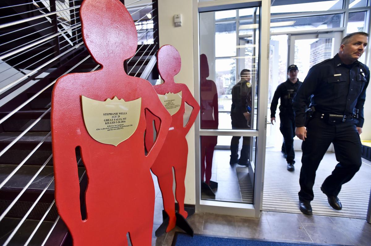 Montana Law Enforcement Academy cadets walk to class Wednesday past the Silent Witness Exhibit