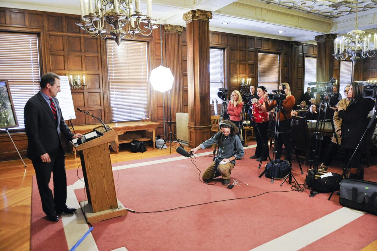 Members of the Montana press corps cover a press conference
