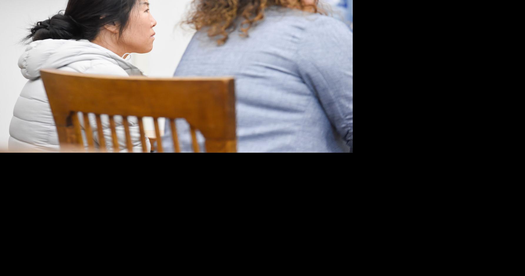 Woman pleads guilty in massage parlor sex trafficking probe