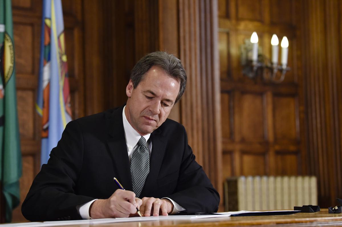 Gov. Steve Bullock signs