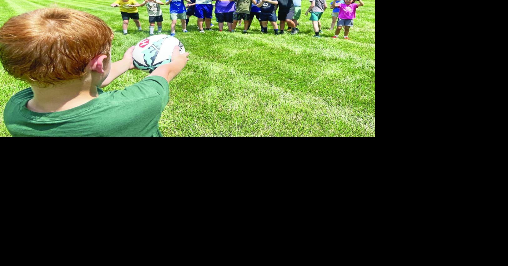 Tech camp introduces kids to rugby