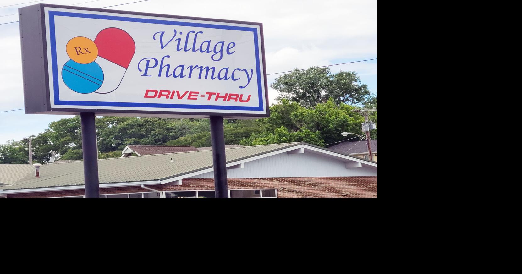 Village Pharmacy Sign.jpg