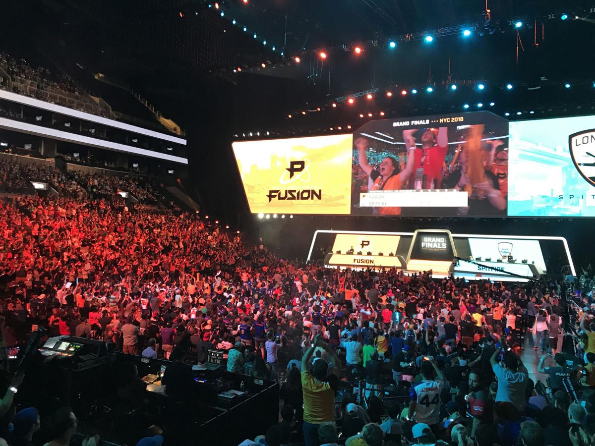 Fans of the e-sports Overwatch League watch as the sixth-seeded Philadelphia Fusion compete against the fifth-seeded London Spitfire in the Overwatch League Grand Finals at the Barclays Center in New York City, N.Y. on Saturday, July 28, 2018.