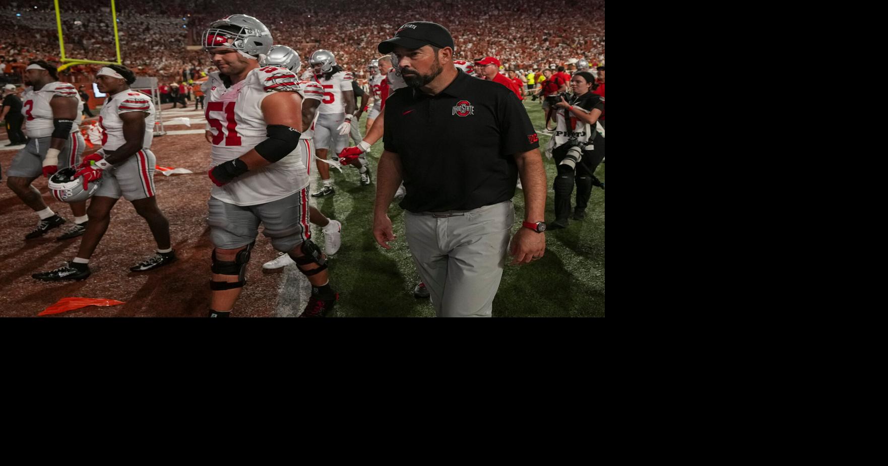 Ohio State Buckeyes head coach Ryan Day watches his players leave the field following the NCAA football game against the Texas Longhorns at Darrell K Royal–Texas Memorial Stadium in Austin, Texas on Sept. 12, 2026. Texas won 24-23.