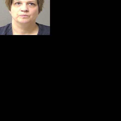 Woman accused of biting cop, trying to run over landlord