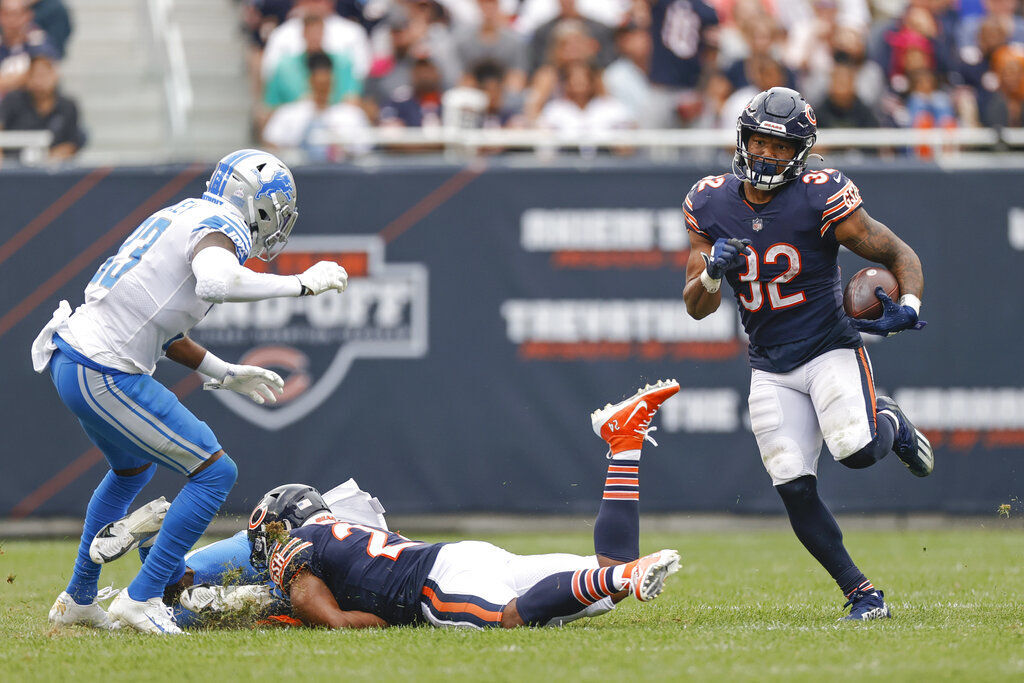 Chicago Bears running back David Montgomery (32) is tackled by Detroit  Lions linebacker Jalen Reeves-Maybin (44) during the second half of an NFL  football game, Sunday, Oct. 3, 2021, in Chicago. (AP