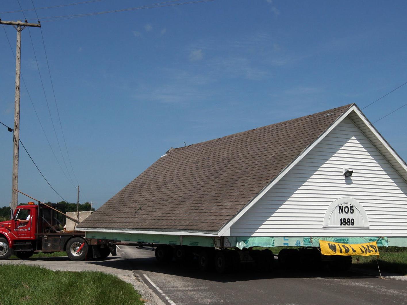 Here S How It Happened Historic Monticello School House Moves To Harristown Education Herald Review Com