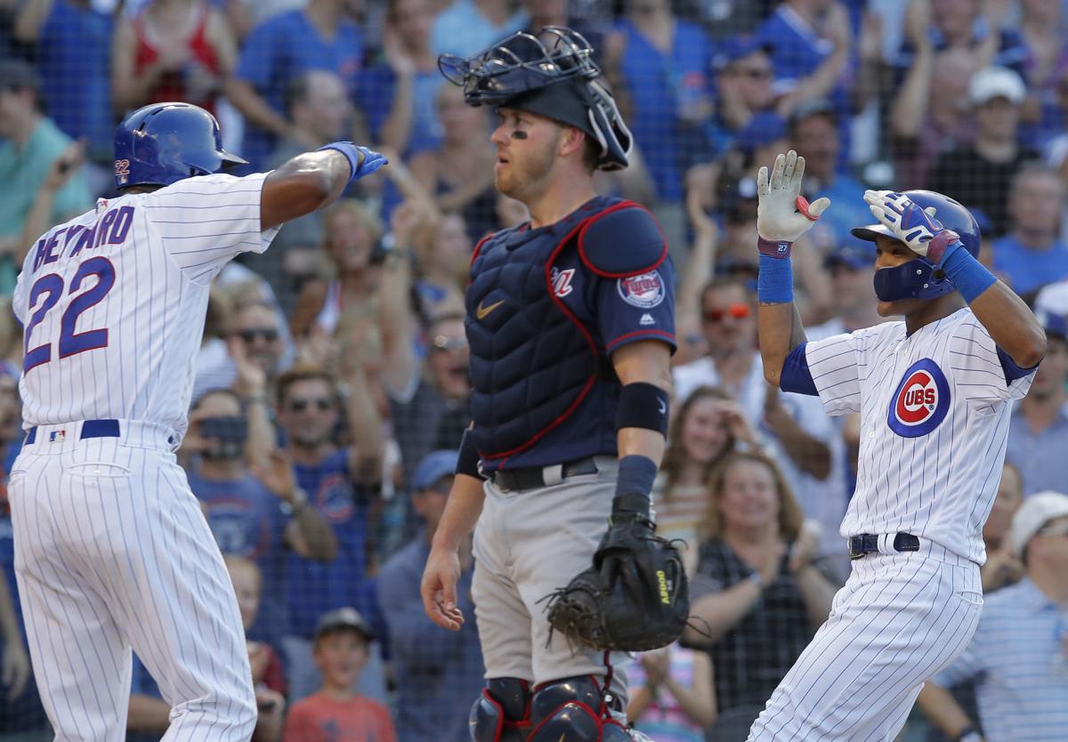 Russell hits slam, Cubs power back for 10-6 win over Twins