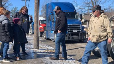 Watch now: Charleston child fighting cancer surprised with truck convoy