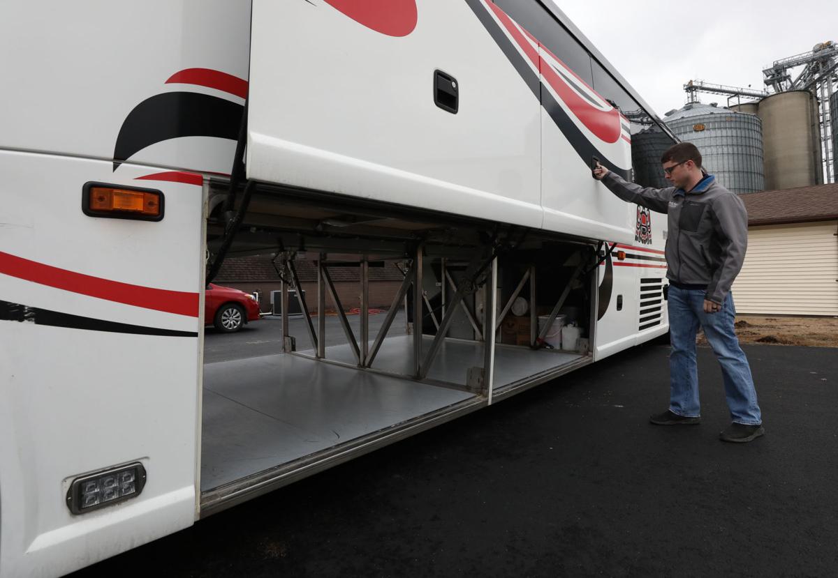 Fill it up Timi's Tours in Moweaqua packing bus with Christmas toys