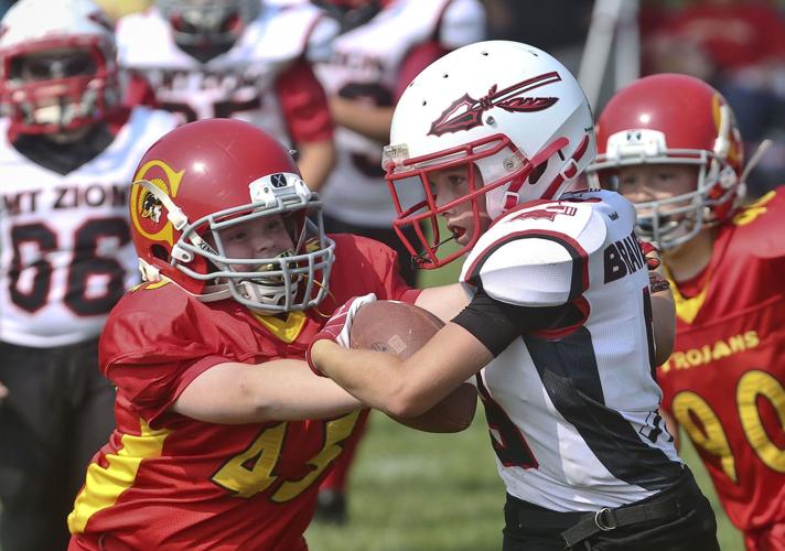 Youth football camp teaches basics with an NFL twist