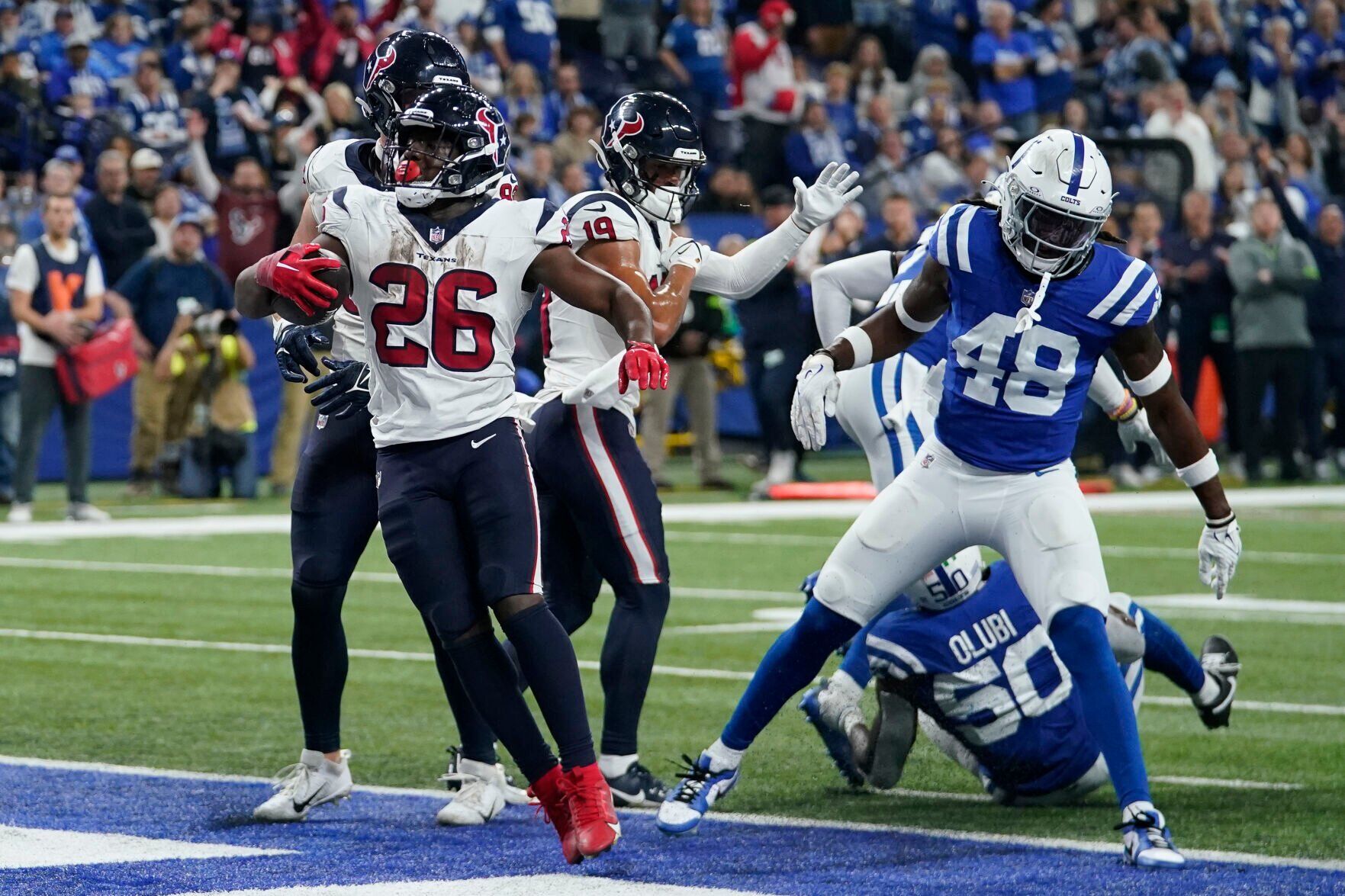 Texans clinch playoff spot with victory over Colts