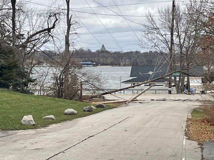 Lost Bridge Road closed by downed line; power outages reported