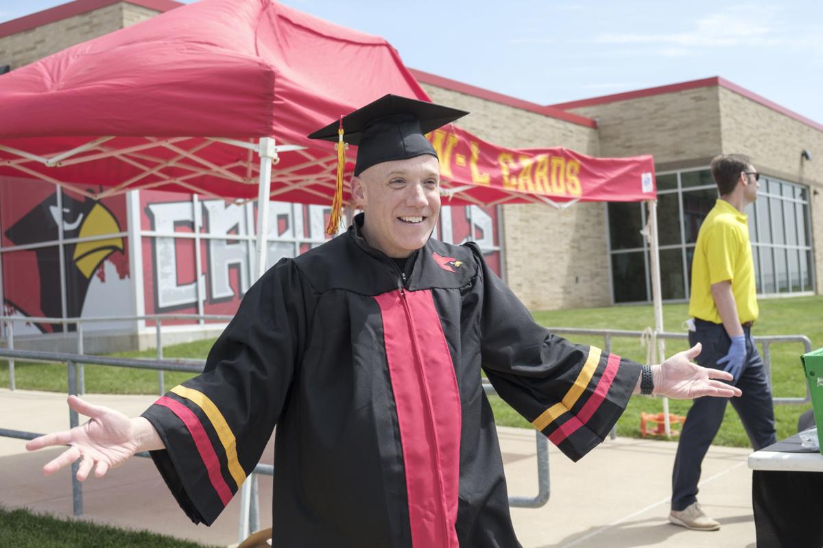 Staff celebrate WarrensburgLatham seniors during drivethrough