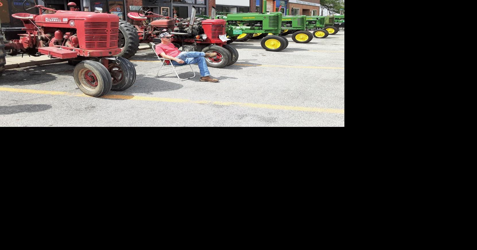 Farmall vintage tractor parade heading to Decatur