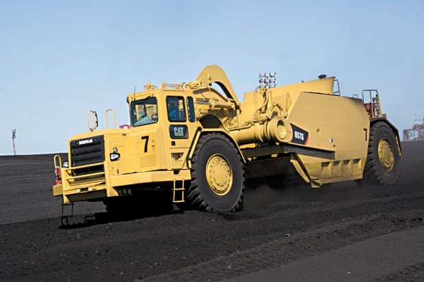 Caterpillar 657g скрепер