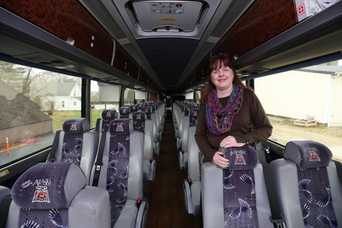 Fill it up Timi's Tours in Moweaqua packing bus with Christmas toys