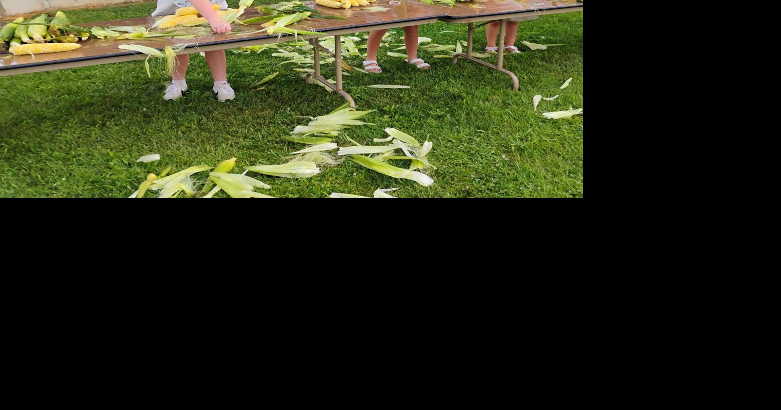 Corn shucking is a family affair at Warrensburg Corn Festival