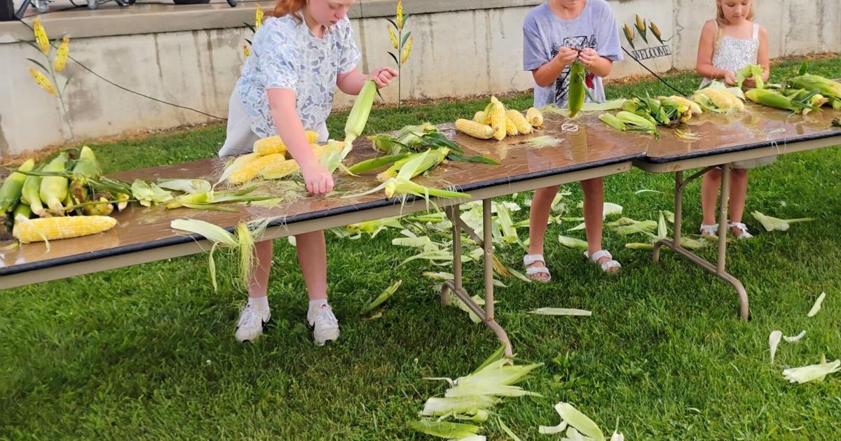 Corn shucking is a family affair at Warrensburg Corn Festival