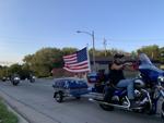 Motorcyclists walking down Franklin Street