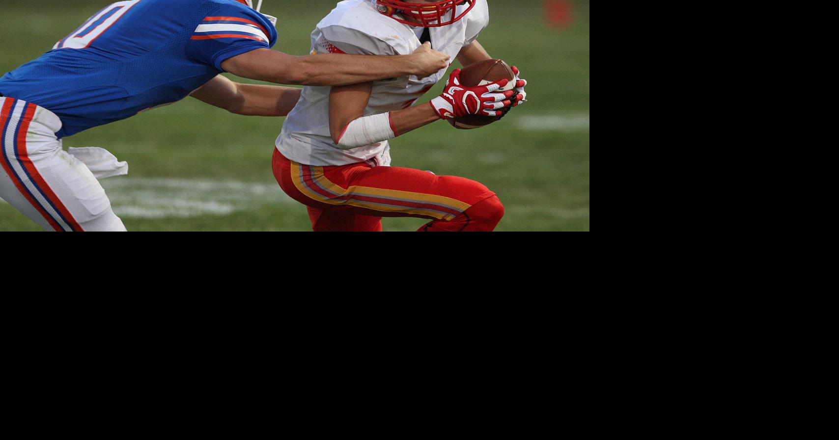 FOOTBALL NOTEBOOK WarrensburgLatham coach Aaron Fricke overseeing