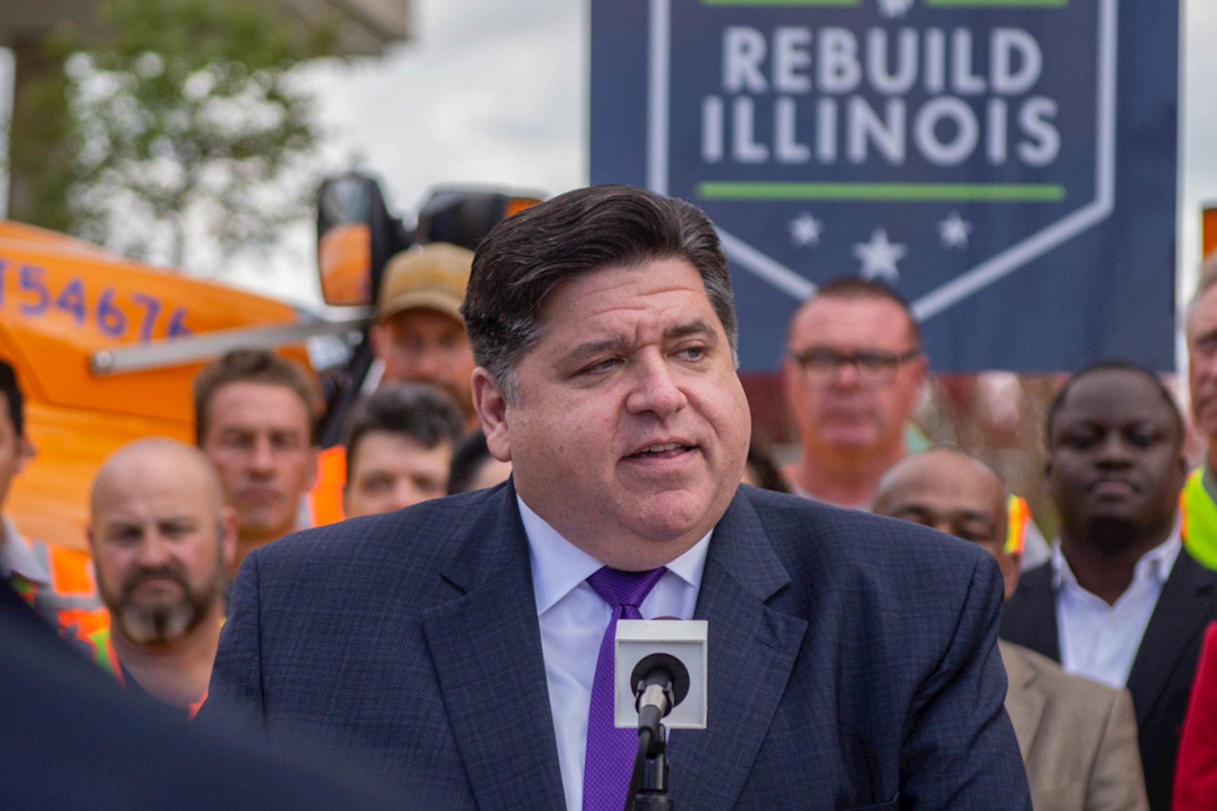 Gov. J.B. Pritzker Signs Measure To Consolidate Hundreds Of Police And ...