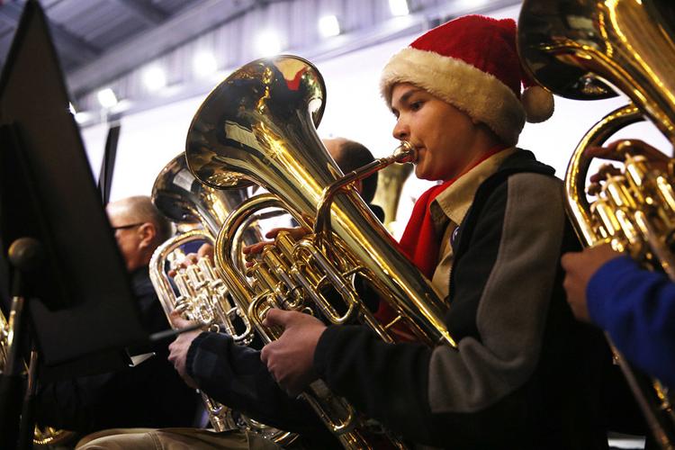 Saying Merry Christmas through music tuba style Local News