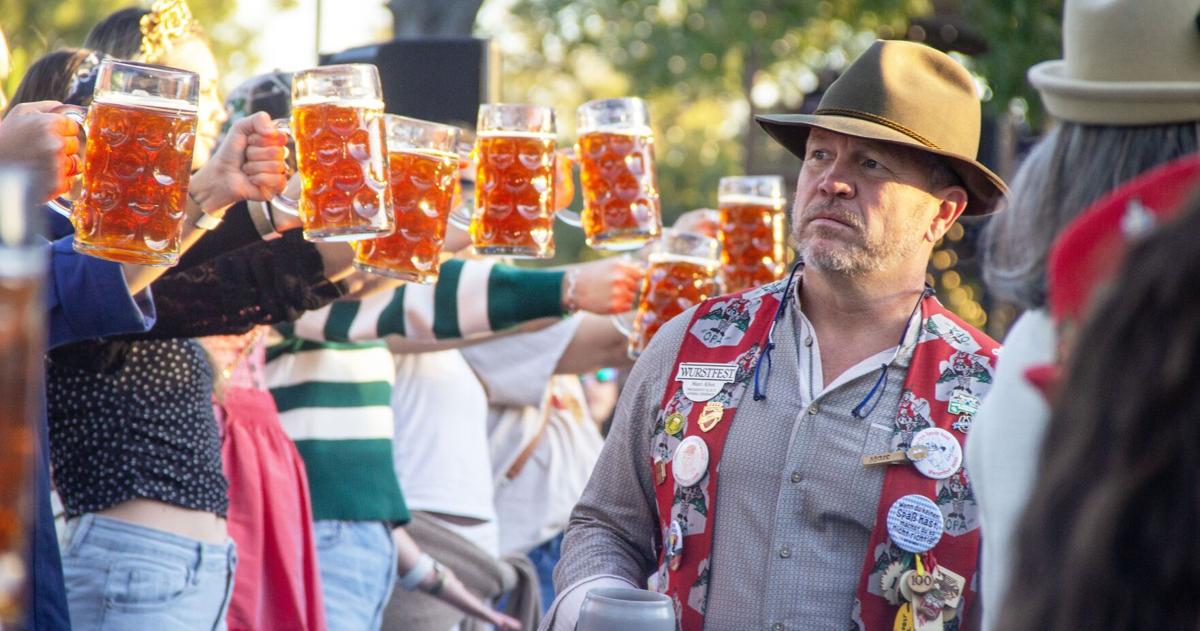 Beer Muscles FLEX THOSE BEER MUSCLES: Competitors test endurance at Wurstfest ...