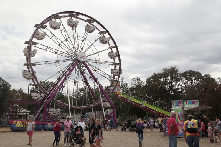 A FAIR FAREWELL Comal County Fair concludes with carnival, rodeo