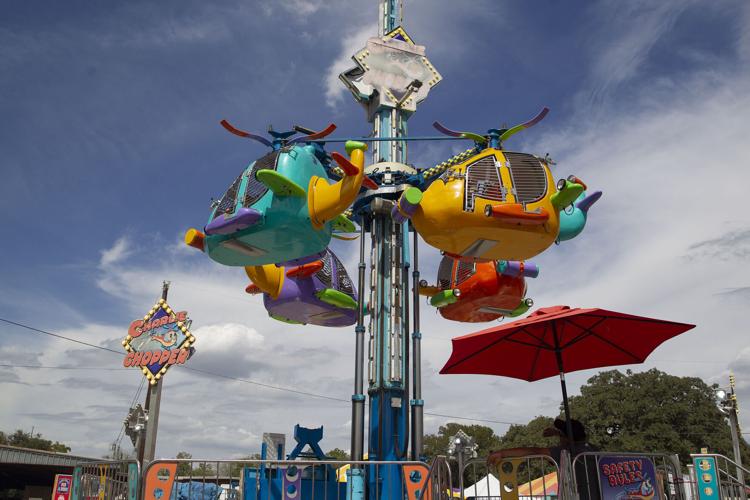 A FAIR FAREWELL Comal County Fair concludes with carnival, rodeo