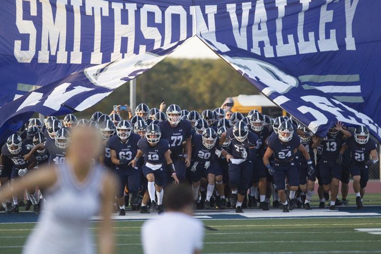 THE HOUSE BUILT BY A HILL Smithson Valley football coach adds to his lasting legacy Community