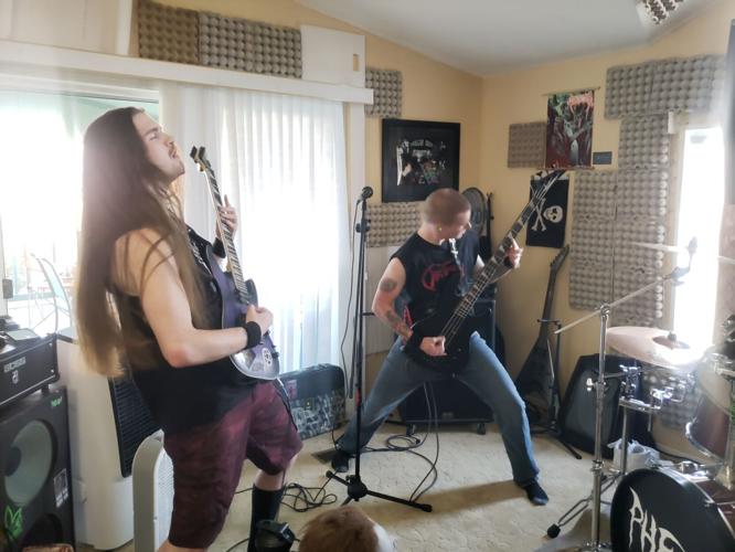 Local metal band Phenom has its own record label and records ...