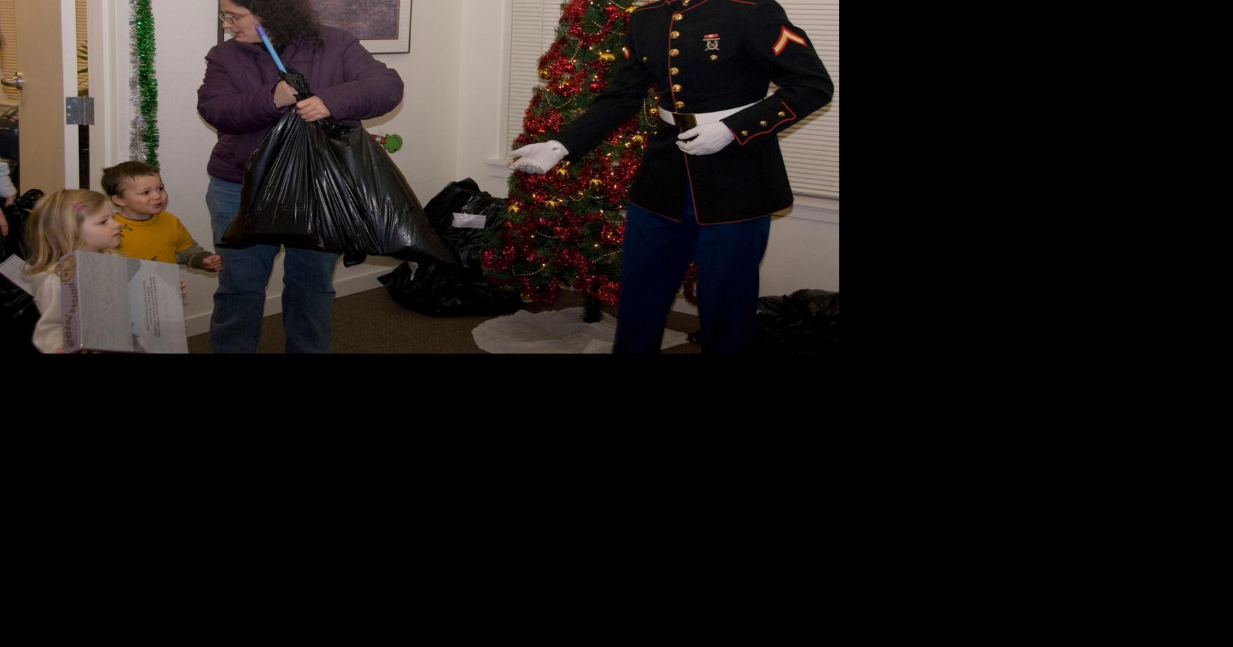 Toys for Tots Marine delivers presents