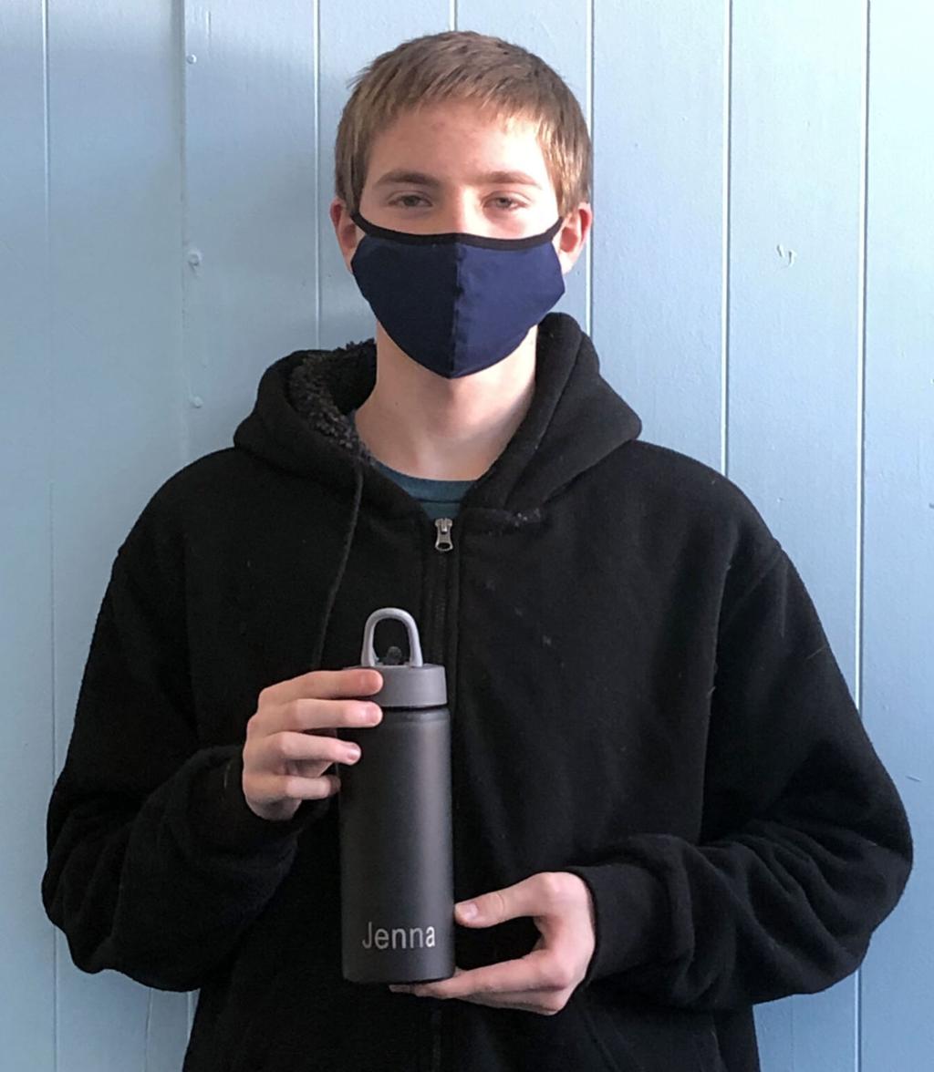 Chiloquin students use laser etcher to personalize water bottles