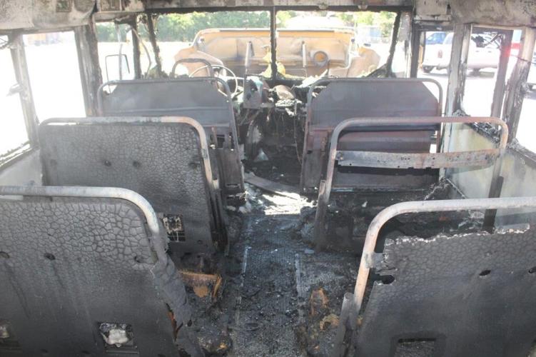 Bus arson case remains open, city says