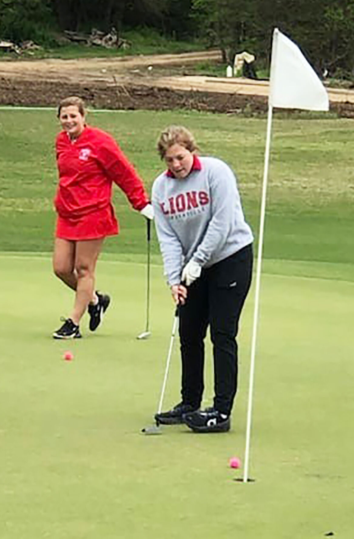 Musil leads Greenville Lady Lions at district golf tournament