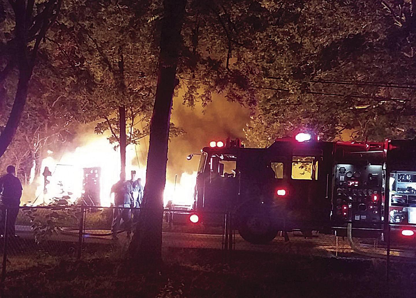 Quinlan house fire results in arson charge, fire marshal says Local News
