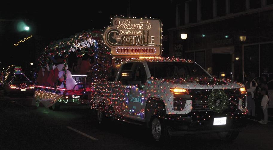 Downtown Greenville Parade helps light the start of Christmas season
