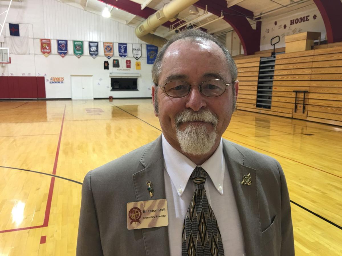 Great Scott(s) One local family links Madison County's two regional