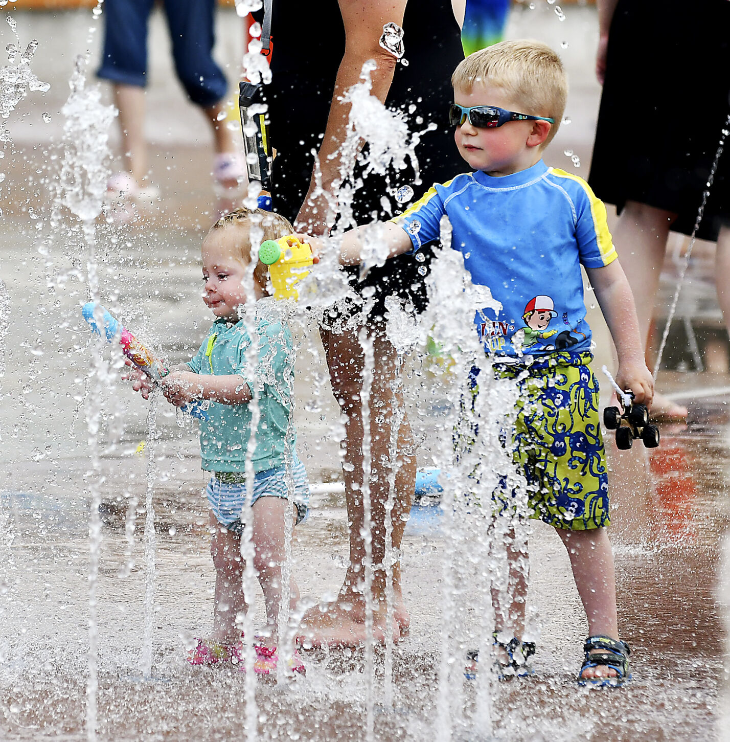 Splash pads offer inexpensive relief from blistering heatwave