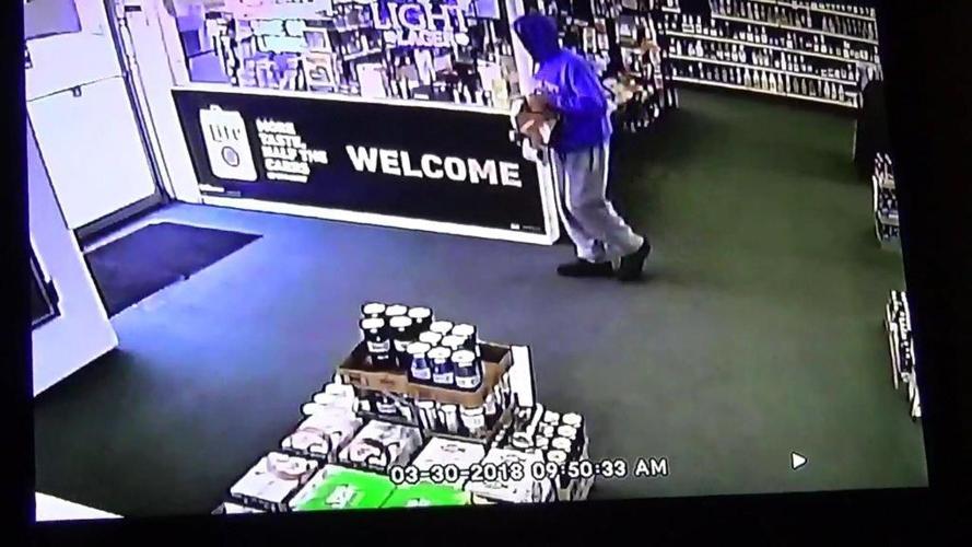 Police searching for suspect in liquor store robbery | Local News ...
