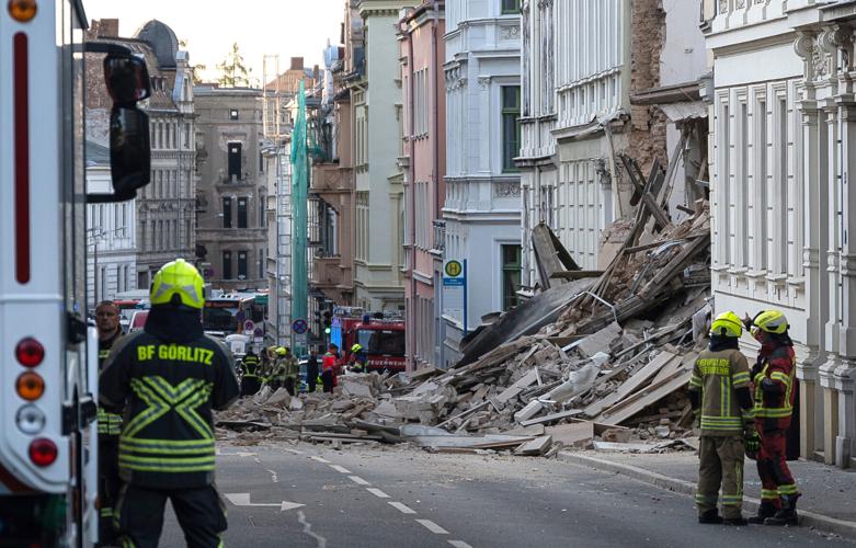 Rescuers search for 3 missing after German building collapse possibly  caused by gas explosion | Nation & World | heraldbulletin.com